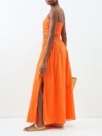 BIRD & KNOLL Ocean cotton-blend maxi skirt in orange / vibrant side slit skirts