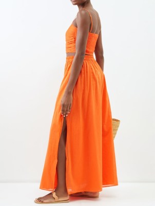 BIRD & KNOLL Ocean cotton-blend maxi skirt in orange / vibrant side slit skirts