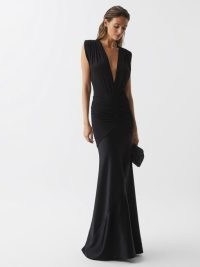 REISS NOA PLUNGE V-NECK SLEEVELESS MAXI DRESS BLACK | sophisticated deep plunging neckline occasion gowns | glamorous long length bodycon fit evening dresses