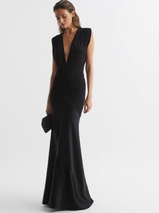 REISS NOA PLUNGE V-NECK SLEEVELESS MAXI DRESS BLACK | sophisticated deep plunging neckline occasion gowns | glamorous long length bodycon fit evening dresses - flipped