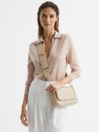 Reiss CLEO SADDLE CAMERA BAG STONE ~ chic leather crossbody with detachable wide shoulder strap ~ minimalist clutch bags ~ casual luxe look