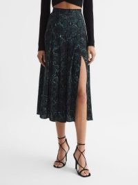 REISS KOLBIE PRINTED SLIP SKIRT TEAL | thigh high slit evening skirts | glamorous animal print occasion clothes | snake prints on women’s fashion