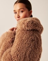 Abercrombie & Fitch Drama Collar Faux Fur Coat in Light Brown | women’s short length fluffy textured coats | womens neutral zip up winter jackets
