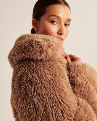 Abercrombie & Fitch Drama Collar Faux Fur Coat in Light Brown | women’s short length fluffy textured coats | womens neutral zip up winter jackets - flipped