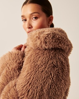 Abercrombie & Fitch Drama Collar Faux Fur Coat in Light Brown | women’s short length fluffy textured coats | womens neutral zip up winter jackets