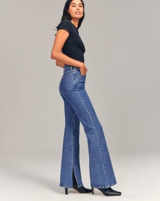 Abercrombie & Fitch A&F High Rise Vintage Flare Jean in Medium Blue | women’s slit hem denim flares | womens flared split leg jeans