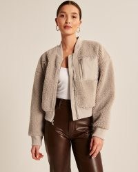 Abercrombie & Fitch Long Sherpa Bomber Jacket in Taupe / women’s textured faux shearling jackets