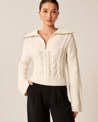 Abercrombie & Fitch Merino Wool-Blend Cable Half-Zip in White | women’s collared sweaters | womens chic pullovers | drop shoulder jumpers