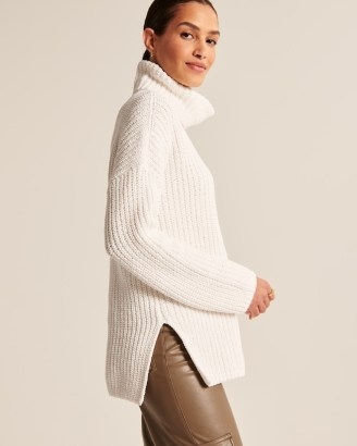 Abercrombie & Fitch Oversized Chenille Turtleneck in White | women’s rollneck side slit jumpers | womens longline high roll neck sweaters | drop shoulder knits - flipped