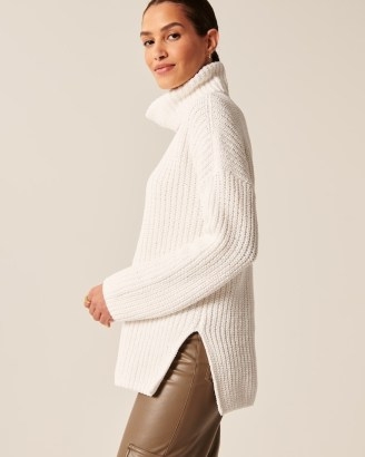Abercrombie & Fitch Oversized Chenille Turtleneck in White | women’s rollneck side slit jumpers | womens longline high roll neck sweaters | drop shoulder knits