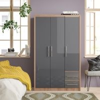 Wayfair Louisa 3 Door Manufactured Wood Wardrobe – Zipcode Design – drawers sit on roller glides for a smooth opening and closing action