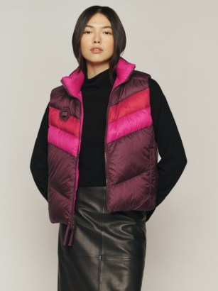 Canada Goose x Reformation Layla Vest in Sangria Multi/Lotus Pink – women’s tonal colour block vests – womens sleeveless puffer jackets – padded gilets - flipped