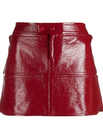 Courrèges faux-leather patent miniskirt in red | fake leather side slit mini skirts | glossy fashion - flipped