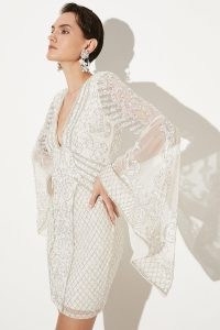KAREN MILLEN Embellished Kimono Sleeve Beaded Mini Dress in Iridescent – bead and sequin covered party fashion – glamorous plunge front semi sheer occasion dresses – evening clothes with wide statement sleeves