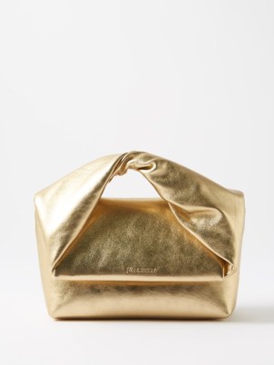 JW ANDERSON Twister medium metallic-leather cross-body bag in gold / small luxe handbags / shiny crossbody bags / twisted top handle