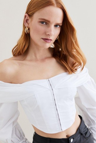Lydia Millen Draped Shoulder Poplin Woven Blouse in White | balloon sleeve corset blouses | cropped fitted bodice bardot tops - flipped