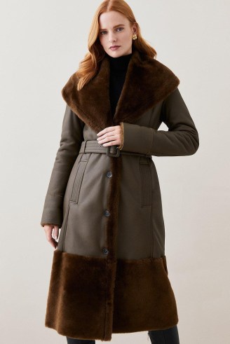 Lydia Millen Shearling And Leather Shawl Collar Belted Coat Dark Olive | luxe green longline coats | womens luxury outerwear from Karen Millen