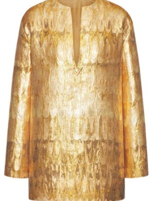 Olivia Culpo’s gold tunic style top, Valentino Golden Wings brocade minidress. Worn with matching trousers, a pair of black patent platforms, oversized rectangular sunnies and carrying a small metallic bag. On Instagram, 8 December 2022 | celebrity street style fashion | social media mini dresses - flipped