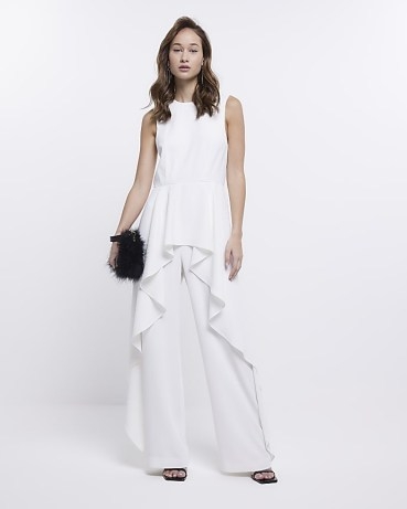 RIVER ISLAND WHITE FRILL JUMPSUIT ~ sleeveless front ruffled jumpsuits ~ going out evening fashion ~ womens all-in-one party clothes - flipped