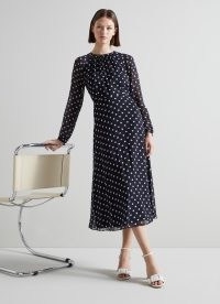 L.K. BENNETT Addison Navy and Cream Spot Recycled Polyester Dress / dark blue sheer overlay polka dot dresses / long sleeve flippy hem frock
