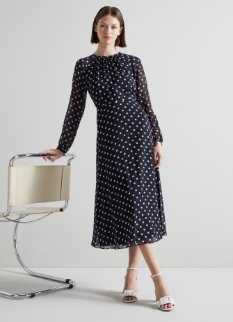 L.K. BENNETT Addison Navy and Cream Spot Recycled Polyester Dress / dark blue sheer overlay polka dot dresses / long sleeve flippy hem frock
