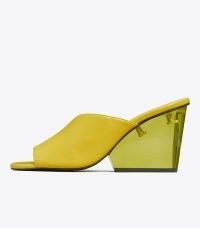 Tory Burch ASYMMETRICAL HEELED MULE SANDAL in Bergamot | lucite wedge heel sandals | clear wedged heels | transparent wedges | citrus coloured shoes