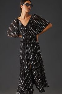 By Anthropologie Ruched Tiered Dress in Black / short flared sleeve spot print dresses / polka dot prints