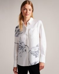 TED BAKER Camilli Longline Floral Print Shirt in White / women’s printed dip hem shirts