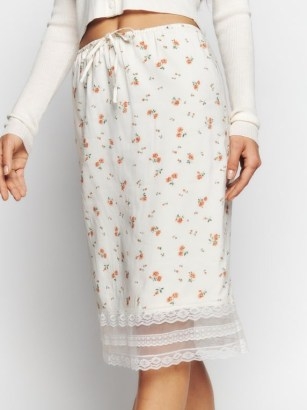 Reformation Emery Skirt in Elia / feminine floral print skirts / sheer hemline / slender ties at waist - flipped