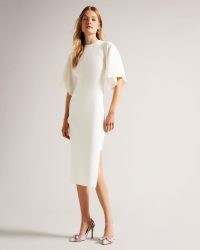 Ted Baker Lounia Fluted Sleeve Knitted Bodycon Midi Dress in White | luxe wide angel sleeve dresses | knitwear evening fashion | chic occasion clothes