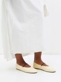 THE ROW Elastic leather ballet flats in cream | slender strap ballerinas | womens luxe ballerina shoes | women’s minimalist footwear