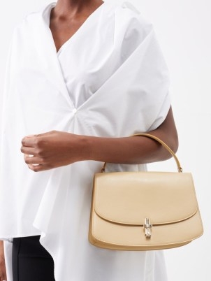 THE ROW Sofia leather handbag in cream ~ chic minimalist vintage style handbags ~ luxe top handle bags - flipped