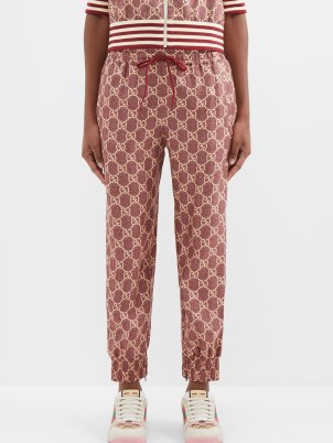 GUCCI Cropped GG-Supreme silk-twill trousers in red ~ women’s sports luxe fashion ~ womens designer sportswear inspired clothes - flipped