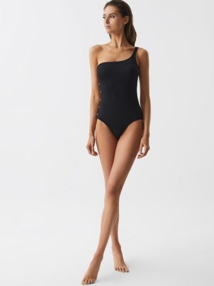 REISS BETHANY ASYMMETRIC SWIMSUIT WITH BUTTON DETAIL BLACK / one shoulder swimwear / asymmetrical swimsuits - flipped