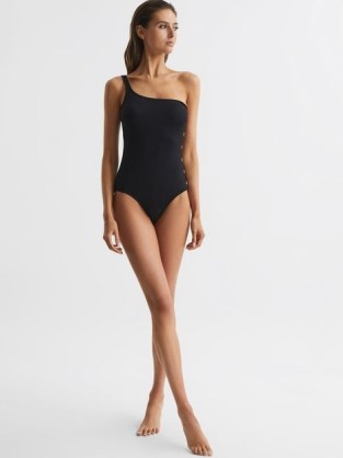 REISS BETHANY ASYMMETRIC SWIMSUIT WITH BUTTON DETAIL BLACK / one shoulder swimwear / asymmetrical swimsuits