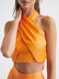 REISS RUBY CROPPED HALTER OCCASION TOP ORANGE / cross front halterneck tops / crop hem / alluring evening occasion clothes