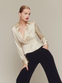 Reformation Rennes Silk Top in Ivory – silky long sleeved collared tops – luxe fashion – wrap style front – ruched details