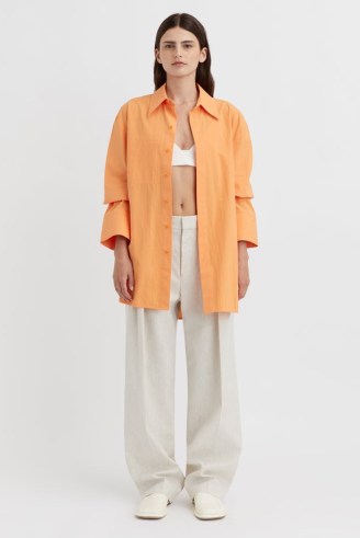CAMILLA AND MARC Sable Cotton Button-Up Shirt in Persimmon Orange / women’s oversized curved hem shirts - flipped