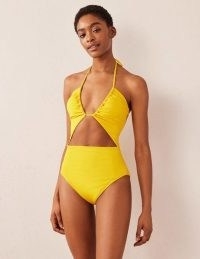 Boden Cut-out Detail String Swimsuit in Saffron Yellow Seersucker / women’s yellow halterneck swimsuits / womens strappy halter swimwear