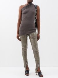 RICK OWENS Dirt high-waist sequinned denim leggings in grey / sequin covered skinny trousers / women’s disco designer fashion / ultra high rise waistline / womens luxury evening clothes / glittering skinnies / luxe occasion clothing / split hems