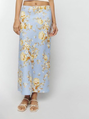 Reformation Layla Linen Skirt in Heavenly / light blue floral midi skirts - flipped