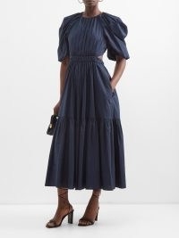 ULLA JOHNSON Claire gathered cotton-poplin midi dress in navy – dark blue puff sleeved tiered dresses – puff sleeve fashion – cut out back detail