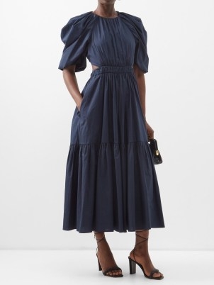 ULLA JOHNSON Claire gathered cotton-poplin midi dress in navy – dark blue puff sleeved tiered dresses – puff sleeve fashion – cut out back detail - flipped