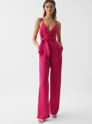Reiss EMILIA V-NECK LINEN JUMPSUIT in Pink / strappy plunge front jumsuits / women’s all-in-one evening fashion / womens occasion clothes / belted self tie waist - flipped