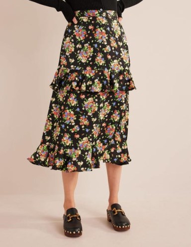 Boden Satin Ruffle Floral Midi Skirt in Black, Wild Cluster | ruffled tiered skirts