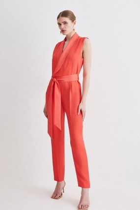 KAREN MILLEN Tuxedo Wrap Sleeveless Jumpsuit in Coral ~ sash tie waist evening jumpsuits ~ women’s all-in-one occasion clothes - flipped