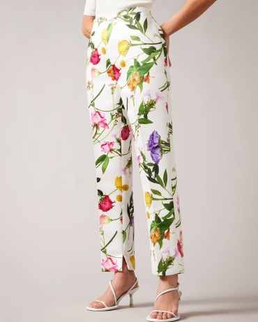 TED BAKER Ziaaht Floral Print Tapered Leg Trousers in White / women’s occasion clothes / wedding guest clothing spring summer 2023 - flipped