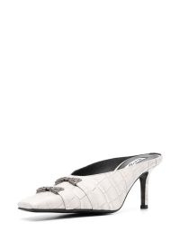 Acne Studios bow-detail heeled mules in off white / women’s croc embossed leather shoes / womens crocodile effect footwear