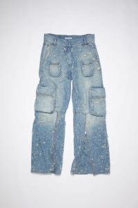 Acne Studios DISTRESSED DENIM CARGO TROUSERS in Mid blue | women’s relaxed fit pocket detail jeans | low rise waist | zipper details | zip hem
