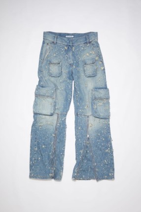 Acne Studios DISTRESSED DENIM CARGO TROUSERS in Mid blue | women’s relaxed fit pocket detail jeans | low rise waist | zipper details | zip hem